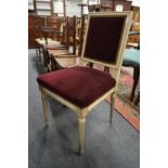 A Regency style cream painted and crimson velvet upholstered side chair.