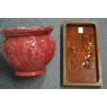 A treacle glazed pottery plaque and a jardiniere.