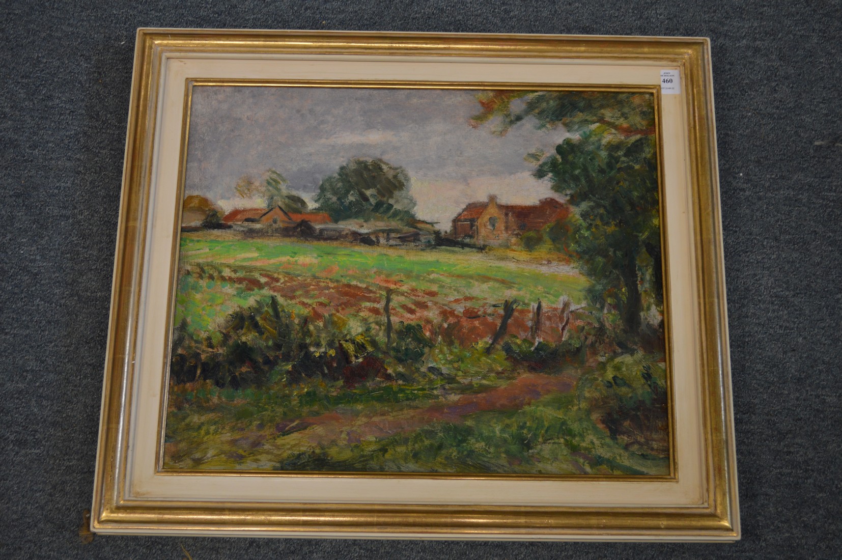 A rural landscape with farm buildings in the distance, oil on board, double sided.