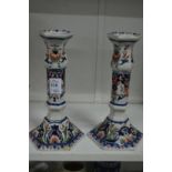 A pair of Delft style candlesticks.
