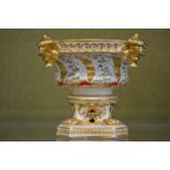 A Derby gilt decorated porcelain pot pourri base.