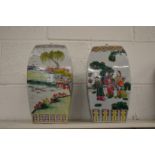 Two large Chinese rounded square shaped jars and cover painted with figures and landscapes in the