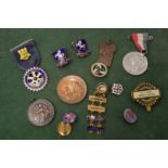 A selection of medals and badges.