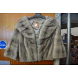 A ladies' fur jacket.