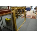 A Regency style gilt framed over mantle mirror.