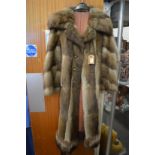 A good ladies' full length fur coat.