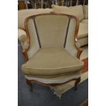 A good French style carved beech framed armchair.