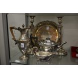A Sheffield Plate wine ewer and other plated items.