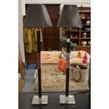 A pair of stylish matching table lamps.