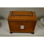 A good George III satinwood sarcophagus shaped tea caddy.