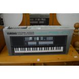 A boxed Yamaha keyboard.