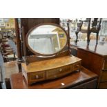 A good inlaid mahogany bow-fronted dressing table mirror.