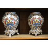 A pair of Vienna porcelain vases decorated in Japanese style.