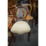 Two Victorian dining chairs.