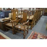 A good set of eight oak high-back dining chairs two with arms.