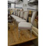 A set of six Swedish Gustavsberg painted and upholstered dining chairs.