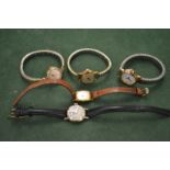 Four various ladies' wristwatches.