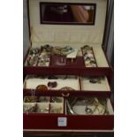 A jewellery box and contents.