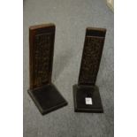 An unusual pair of Chinese carved wood calligraphic tablets on stands.
