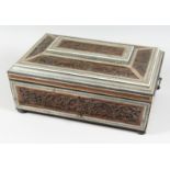 A GOOD SANDALWOOD AND CARVED CEDAR WOOD WORK BOX with carved panels and fitted interior with mirror.