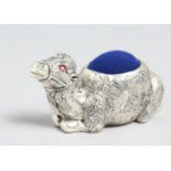 A SILVER PLATED CAMEL PIN CUSHION.