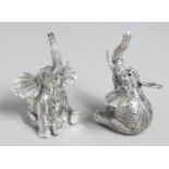 A PAIR OF .800 WHITE METAL ELEPHANT SALTS AND PEPPERS