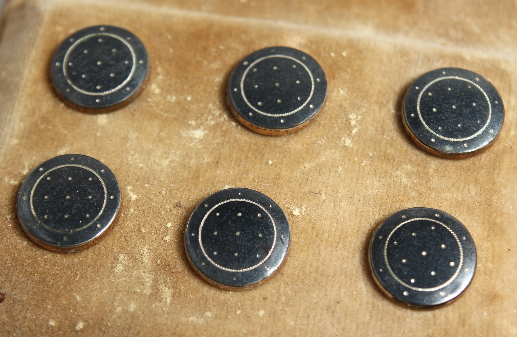 SIX SILVER AND ENAMEL SHIRT STUDS.