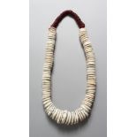 A PAPUA NEW GUINEA SHELL NECKLACE.