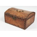 AN 18TH CENTURY LEATHER DOMED BOX with brass studs. 11ins long.