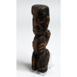 A MAORI CARVING. 7.5ins long.