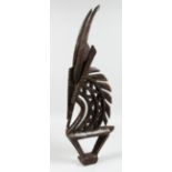 A BAMBARRA PIERCED AND CARVED WOODEN HEAD DRESS, 31ins long.