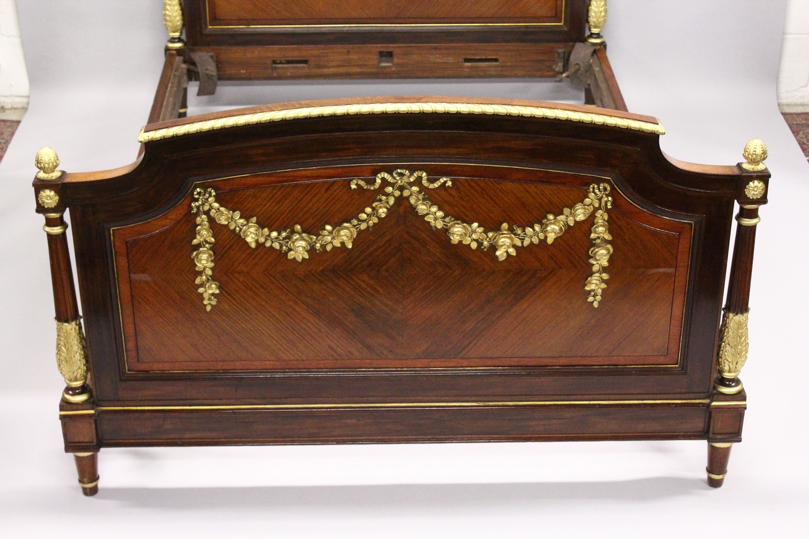 A GOOD LATE 19TH CENTURY FRENCH LOUIS XVI STYLE KINGWOOD MAHOGANY AND ORMOLU BED FRAME, the - Image 2 of 7