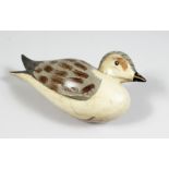 A PAINTED WOODEN DECOY DUCK. 9ins long.