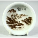 A CHINESE REPUBLIC STYLE PORCELAIN BRUSH WASHER, decorated with a landscape scene, 10cm diameter.