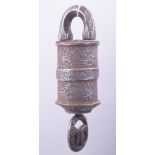 AN ISLAMIC CALLIGRAPHIC STEEL LOCK, engraved with bands of calligraphy and floral decoration, 17cm