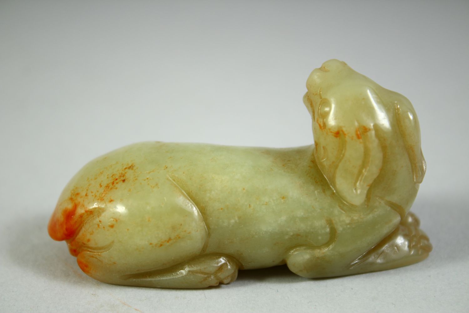 A CHINESE CARVED JADE MODEL OF A RECUMBENT BEAST, 6.5cm long. - Image 3 of 5