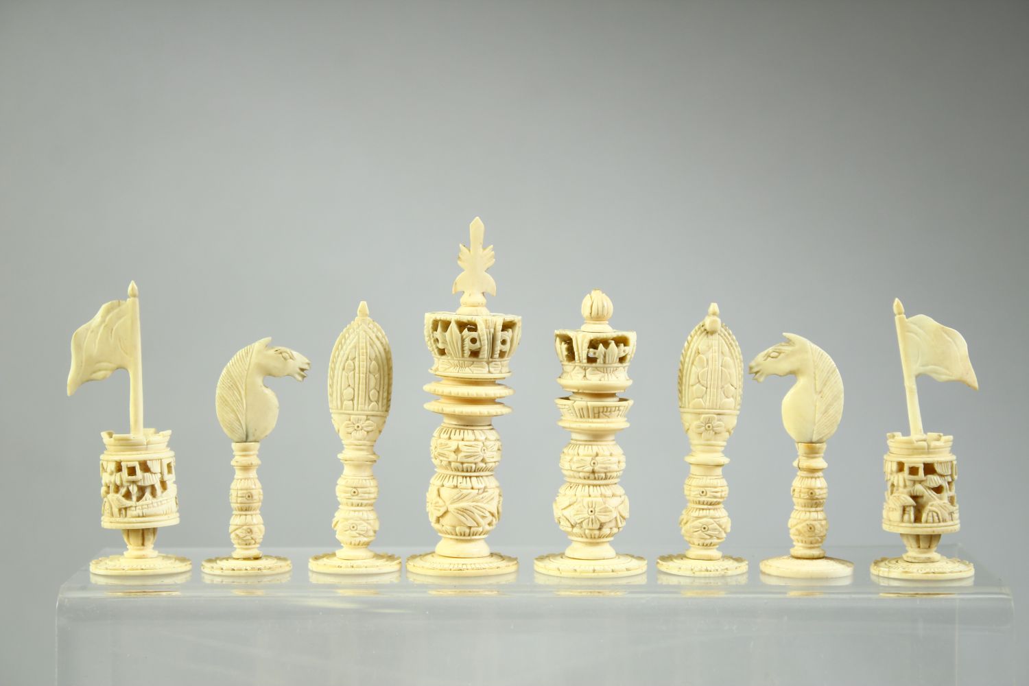 A BURMESE CARVED AND STAINED IVORY CHESS SET, each piece intricately carved, complete, (32 pieces). - Image 2 of 5