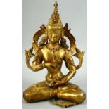 A NEPALESE VAJRASATTVA STATUE, inlaid with semi precious stones, 27.5cm high.