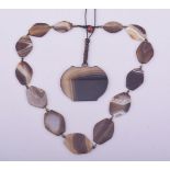 A GOOD AGATE NECKLACE, together with an agate pendant on string necklace.