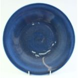 A CHINESE BLUE GLAZE PORCELAIN DISH, 28.5cm diameter.