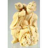 A SMALL JAPANESE CARVED IVORY OKIMONO of a figure with a gourd shape water flask on his shoulder,