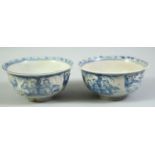 A PAIR OF CHINESE BLUE AND WHITE PORCELAIN BOWLS, each painted with figures, 14cm diameter.