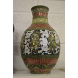 A large continental pottery vase.