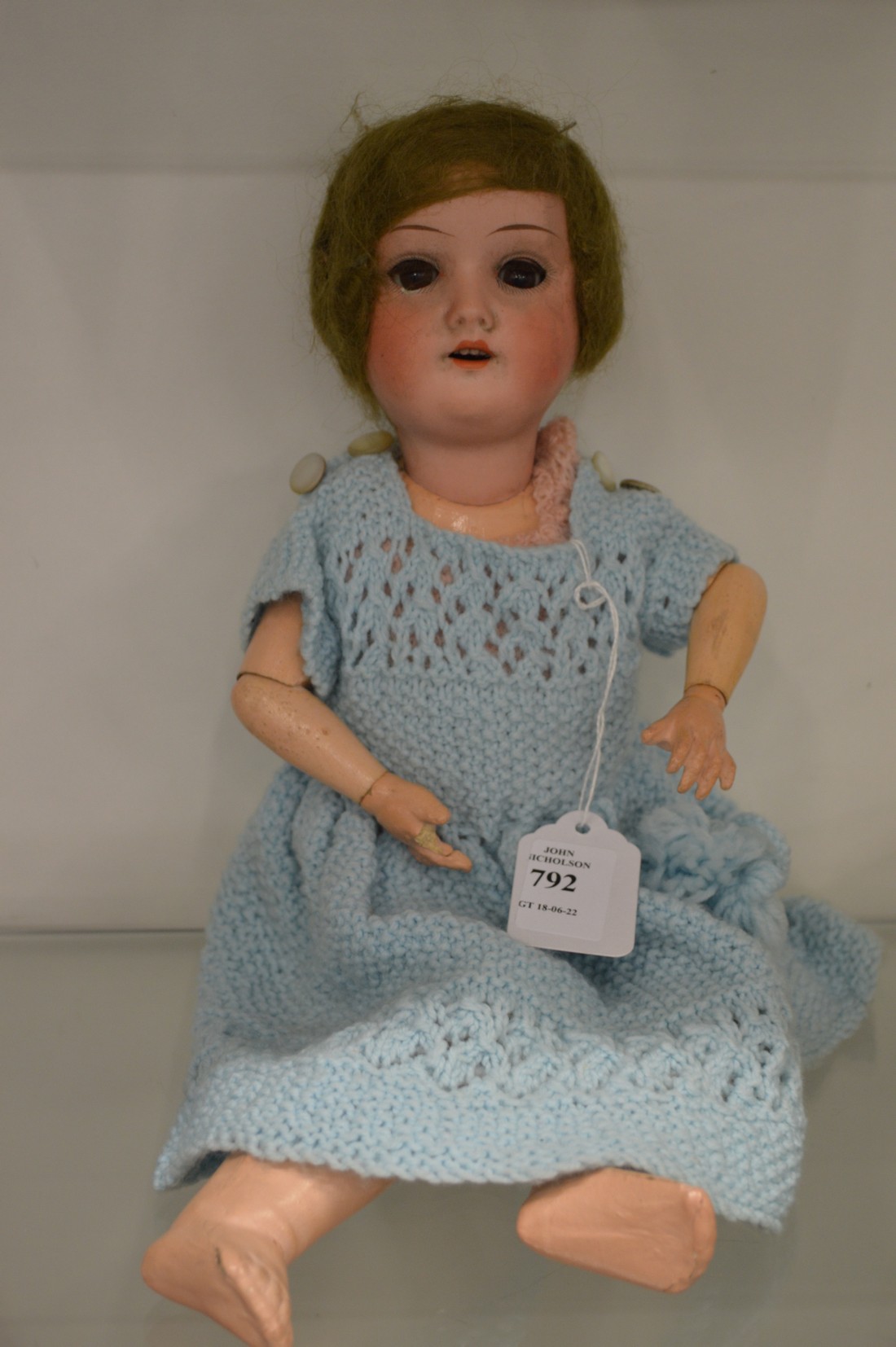 A Simon & Halbig porcelain headed doll.