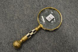 A decorative magnifying glass.