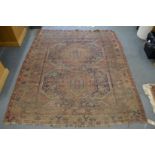 An old Persian rug (worn).