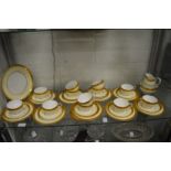 A Royal Worcester gilt and cream decorated part service comprising numerous cups, saucers, side