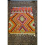A colourful Kilim rug.