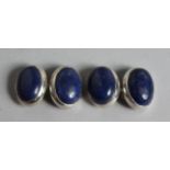 A PAIR OF SILVER AND LAPIS CUFF LINKS