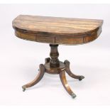 A GOOD REGENCY ROSEWOOD TILT TOP CARD TABLE with green baize cover, turned column support ending